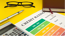 A credit card, illustrating credit score as an insurance factor.