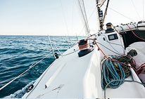 A boat with visible damage, representing physical damage coverage.
